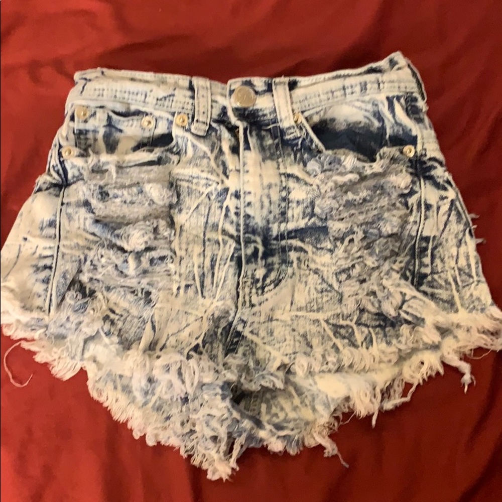 Distressed blue washed jean shorts